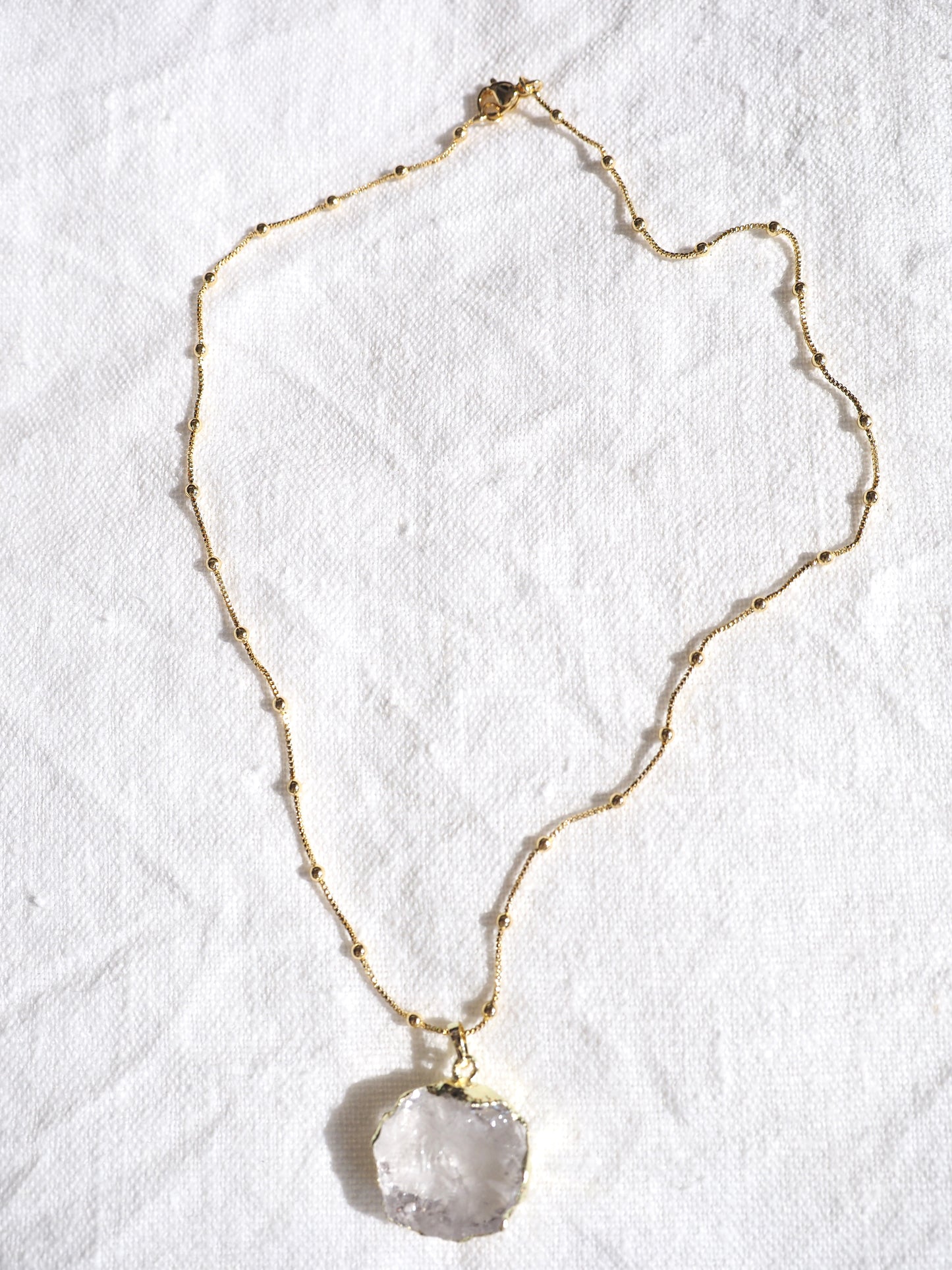 Jewellery Luminary necklace (crystal quartz pendant)